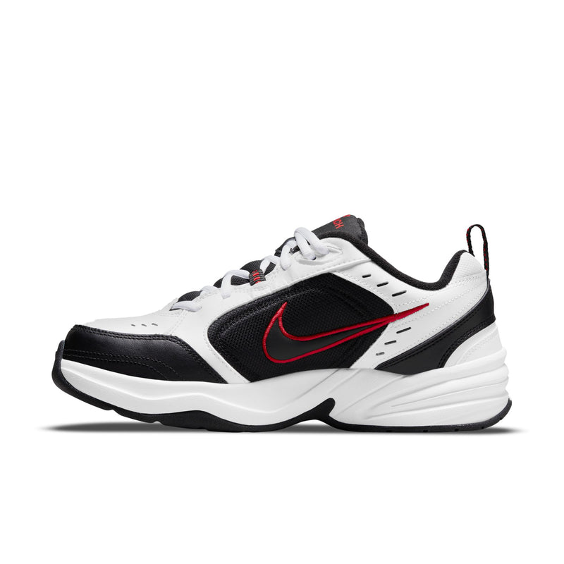 White and black men’s lace-up sneaker with red swoosh and thick white midsole
