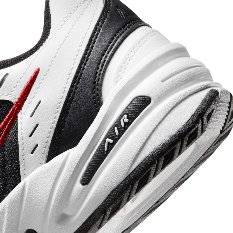 Close-up side of men’s sneaker midsole showing molded cushioning and black details