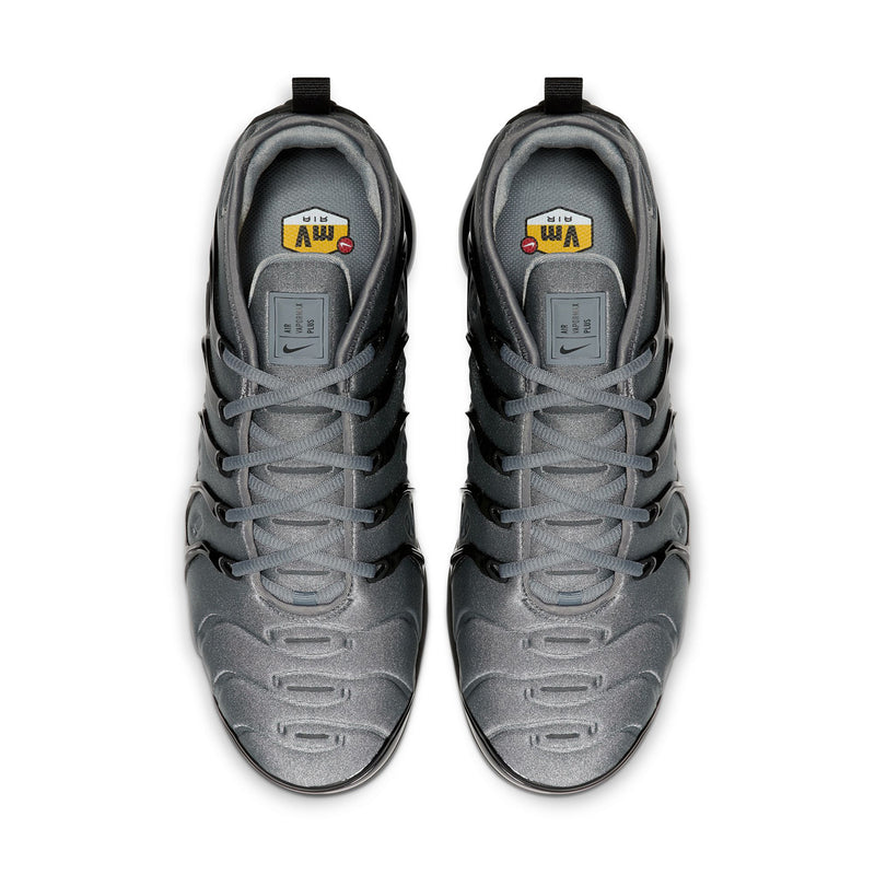 Air-cushion sneaker pair with cool grey mesh upper, grey laces, and Nike logo on tongue