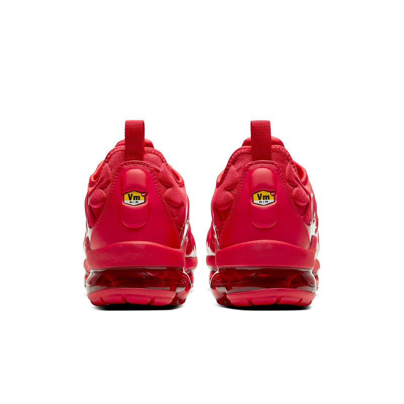 Pair of men's red sneakers heel view with pull tabs and padded back cushioning.