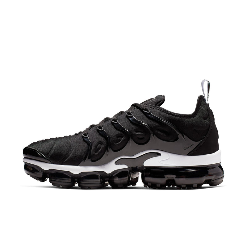 Men's black running shoes with white swoosh, lace-up front, and cushioned midsole