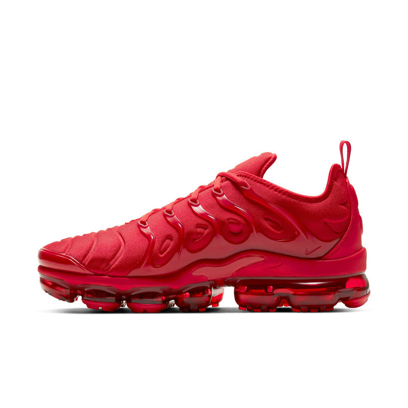 Men's red running shoe side profile with lace-up closure and Air bubble outsole.
