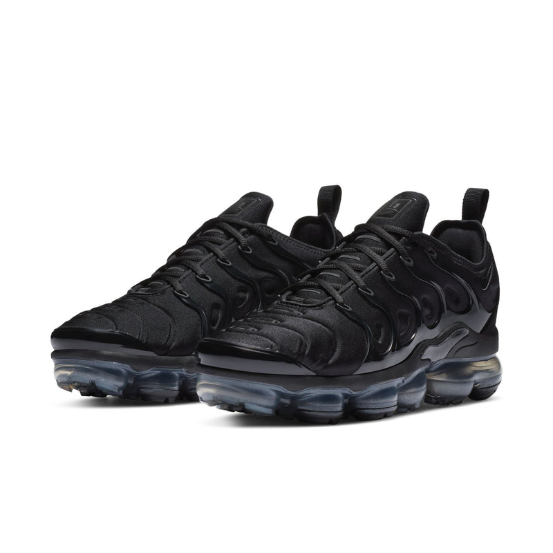 Women's black lace-up sneakers with wavy side logo and translucent air sole units.