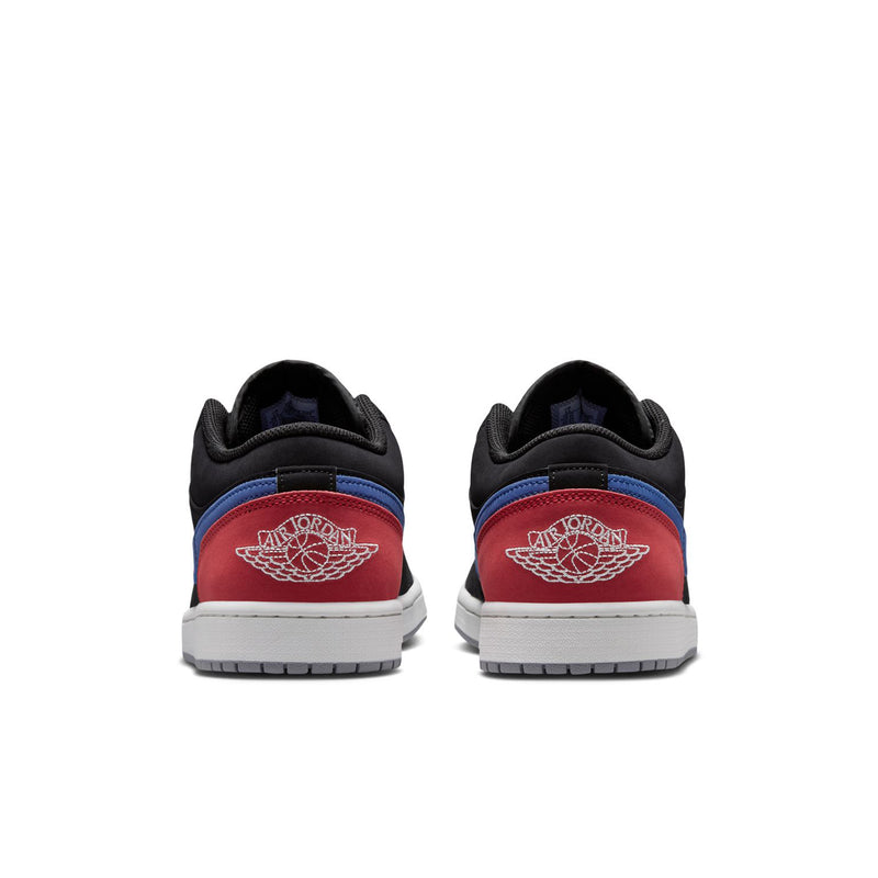 Black low-top sneakers with red-and-blue heel logo and white midsoles