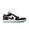 Mens low-top sneakers in white and black with Nike swoosh, laces, and blue outsole