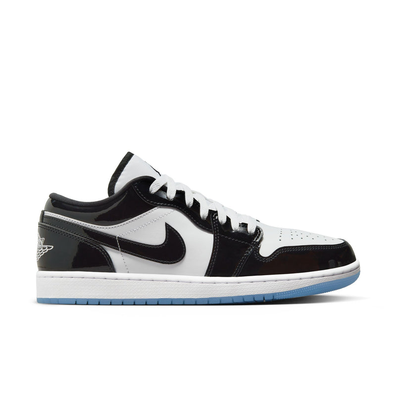 Mens low-top sneakers in white and black with Nike swoosh, laces, and blue outsole