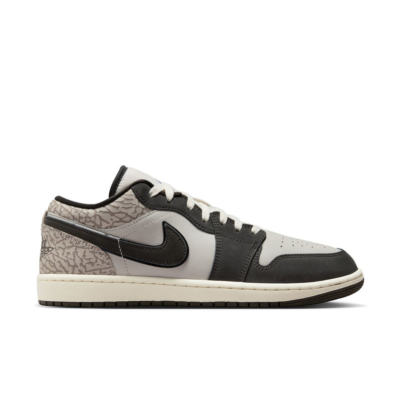 Men's low-top sneakers with white laces, black swoosh, gray patterned quarter panel