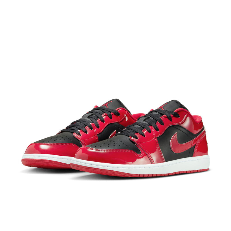 Pair of men's low-top sneakers in red, black, and white with black laces and swoosh.