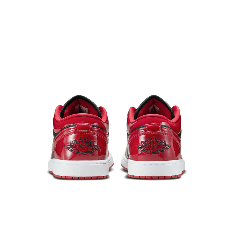 Men's low-top sneakers heel view with red back panel and embroidered Air Jordan logo.