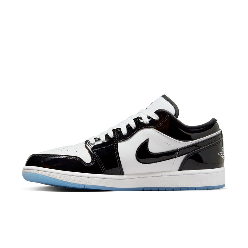 Mens low-top sneakers side view in white and black with Nike swoosh and blue outsole