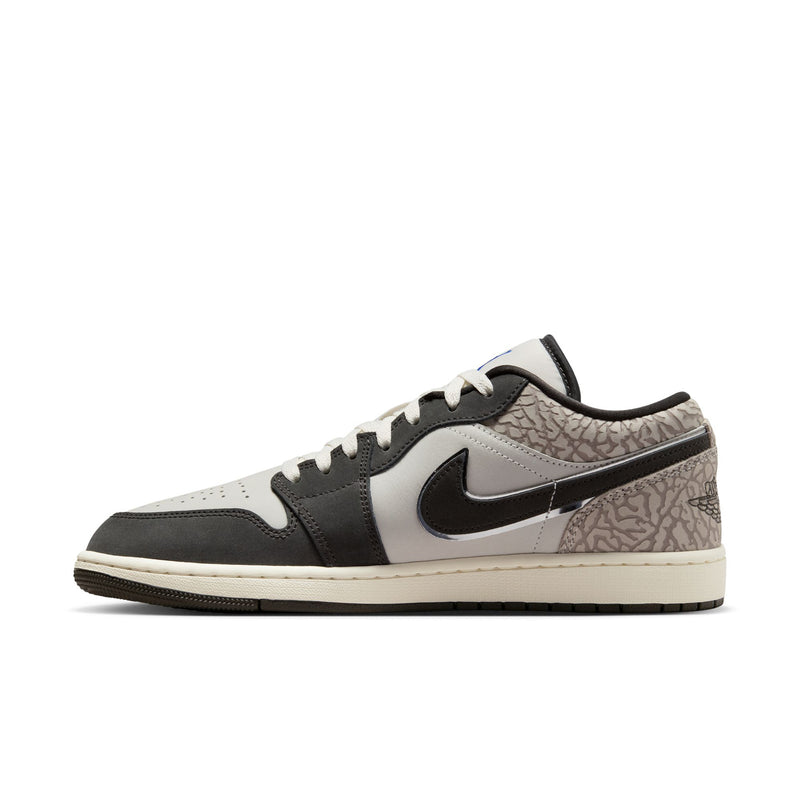 Men's low-top sneakers in gray and white with black swoosh and sail-colored midsole