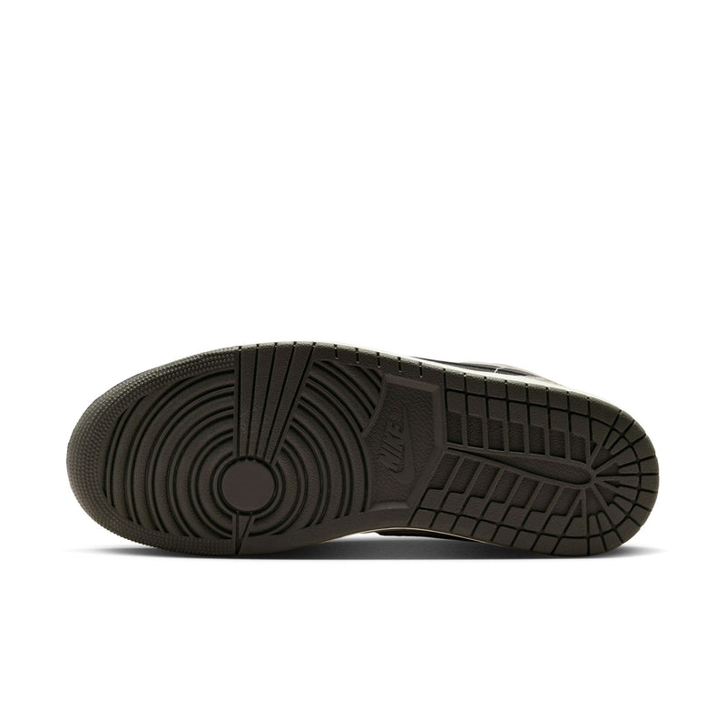 Men's sneaker outsole in dark rubber with textured tread pattern