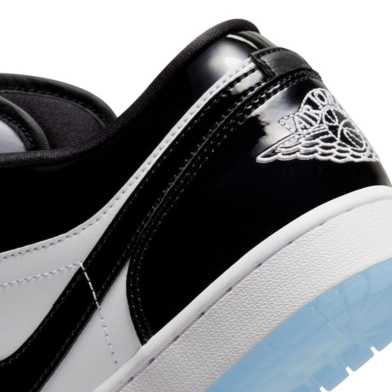 Mens sneaker heel close-up with Jumpman logo, black-and-white panels, and blue outsole