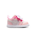 Pink toddler low-top sneakers with hook-and-loop straps and flower heel accents