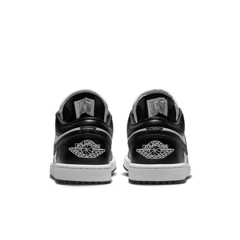 Black and white sneakers with Air Jordan logo on heel and white midsole