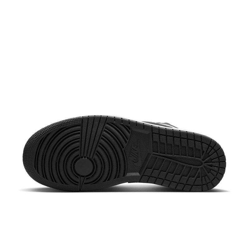 Black rubber outsole with detailed tread pattern for grip