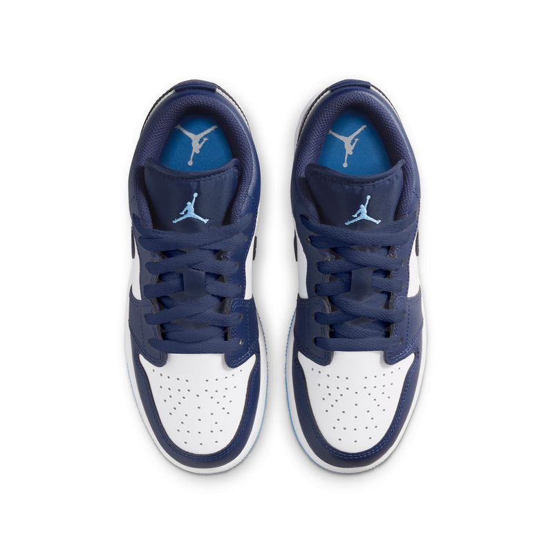 Youth low-top sneakers with navy tongues showing Air Jordan logos and white toe perforations
