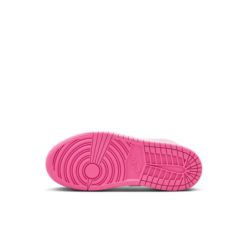 Kids mid-top sneakers outsole view, pink traction tread under light gray shoe