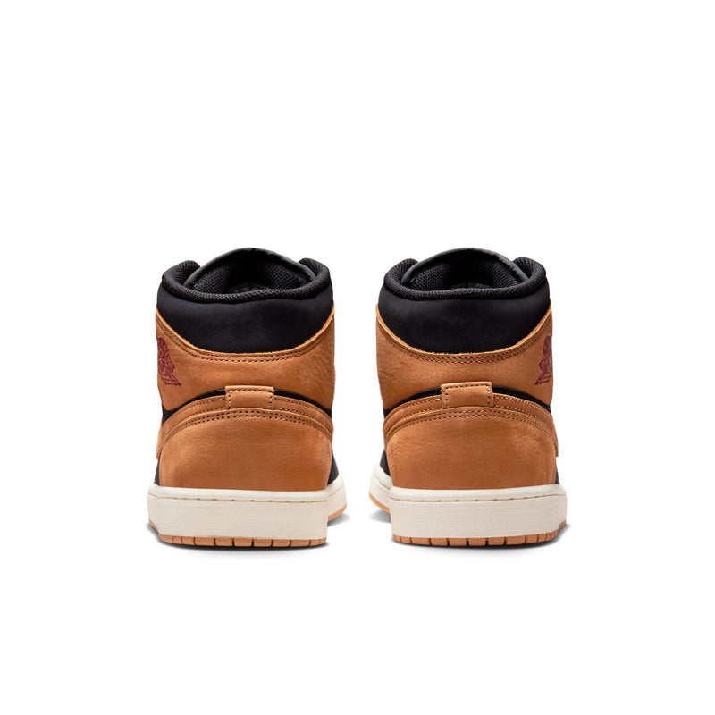 Black and tan mid-top sneakers with tan heel panel and white outsole