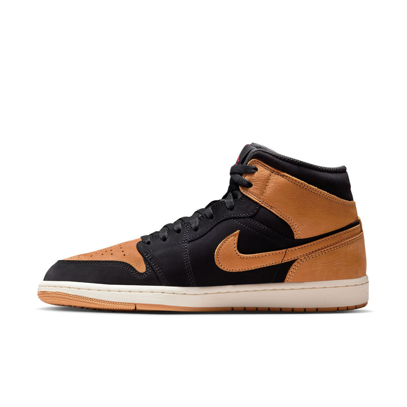 Black and tan mid-top sneaker with tan swoosh and perforated toe box