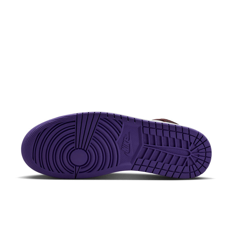 Purple rubber outsole with traction pattern for mid-top sneakers