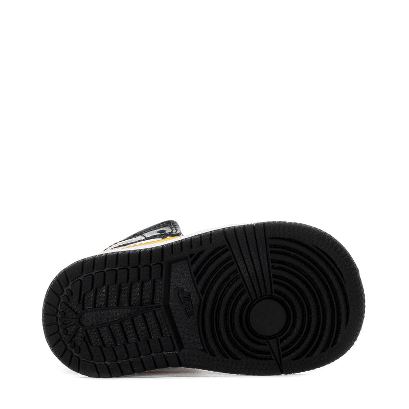 Toddler high-top sneaker outsole, black rubber tread with circular pivot pattern