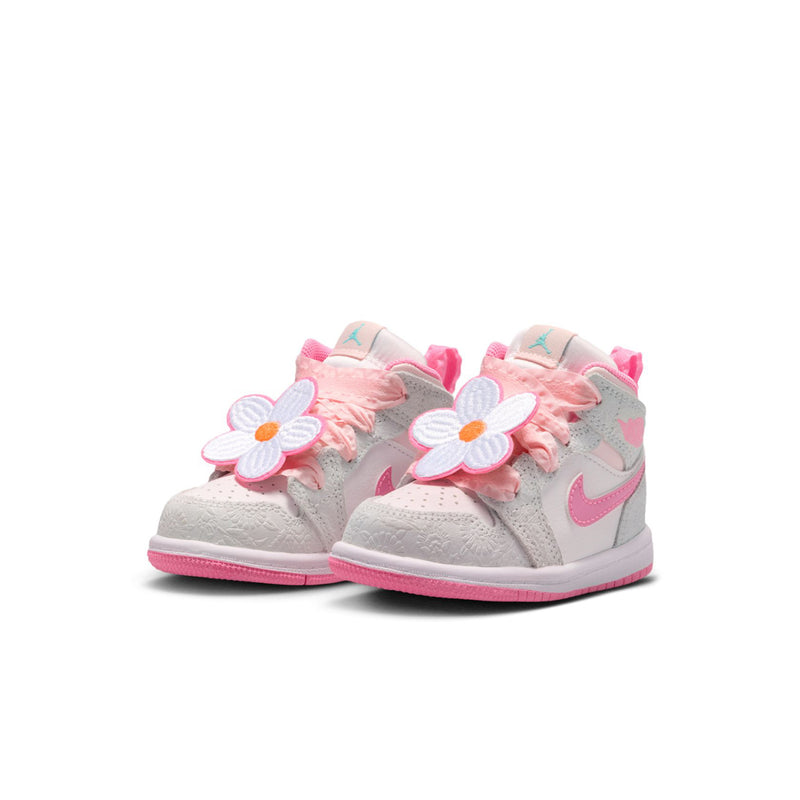 Toddler high-top sneakers, light gray uppers with pink swooshes and flower applique on straps