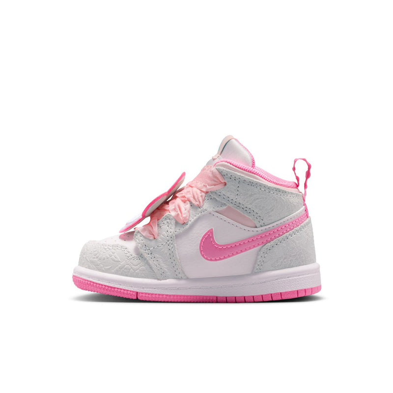 Toddler high-top sneakers in light gray with pink trim, pink laces, and swoosh detail
