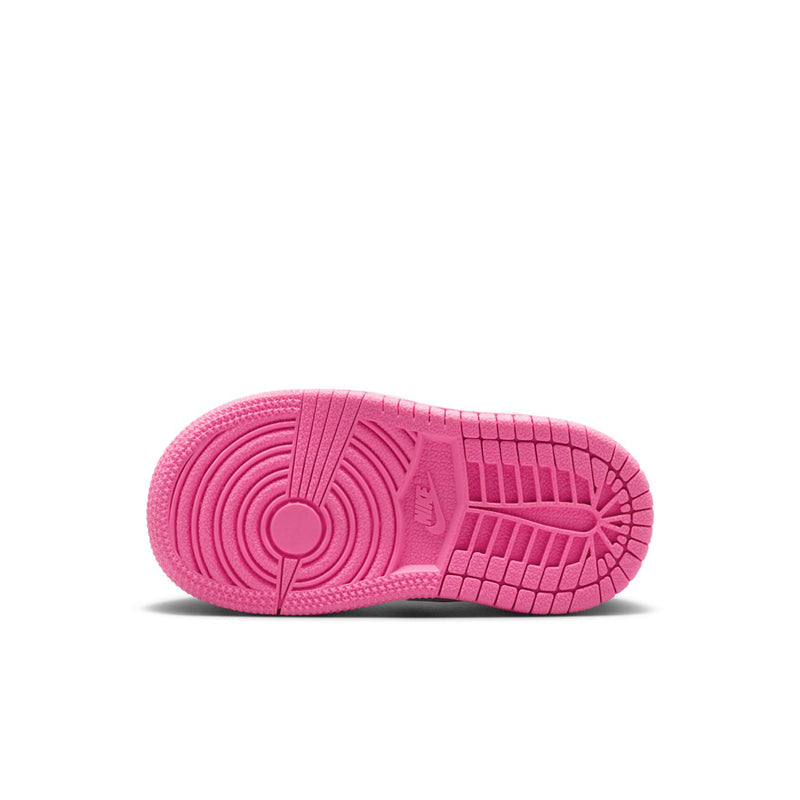 Toddler high-top sneaker outsole in bright pink with textured tread pattern