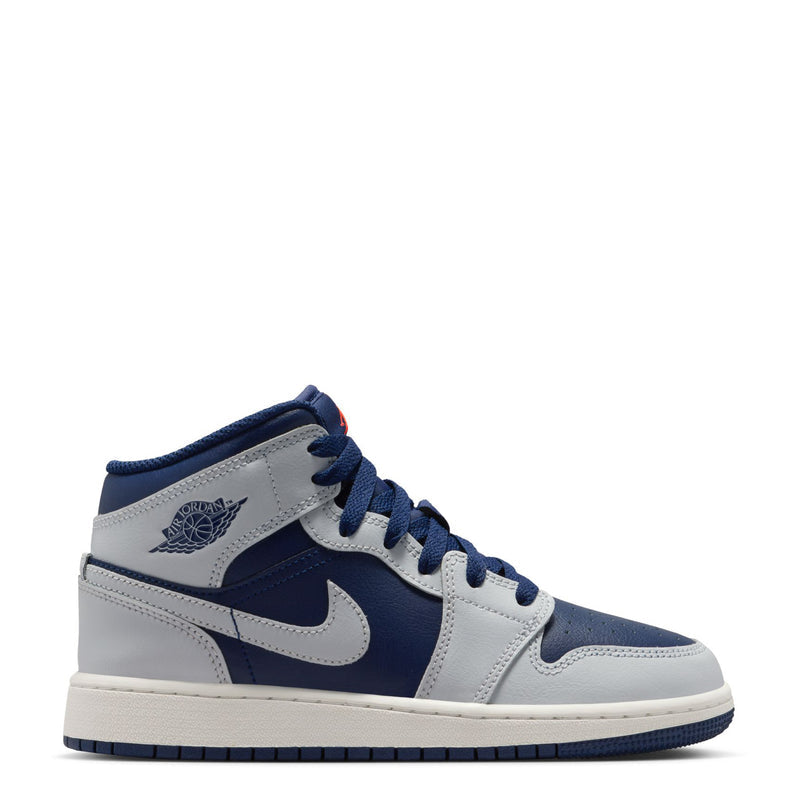 Youth mid-top sneakers in navy and light gray with dark blue laces