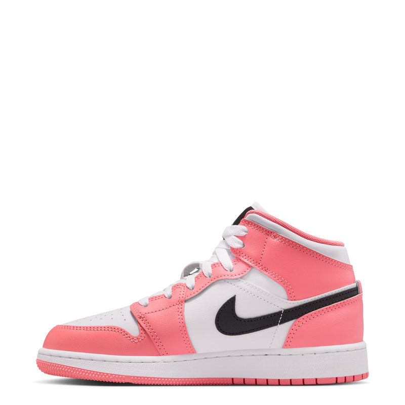 Youth mid-top sneakers side view in pink, white, and black swoosh