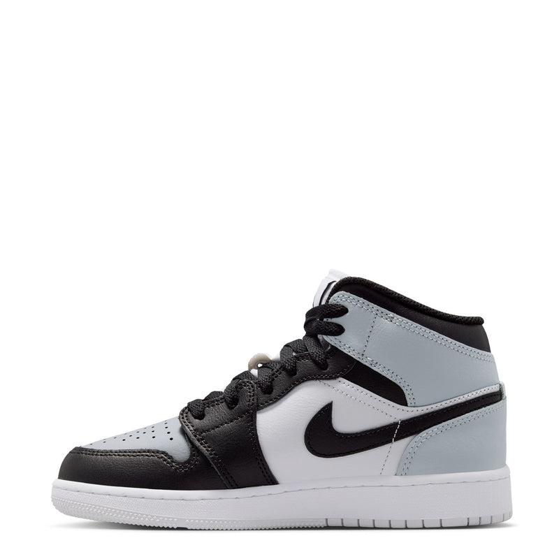 Youth high-top sneaker in light gray and black, lace-up with large swoosh