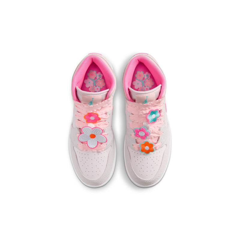 Youth mid-top sneakers top view: light gray uppers with pink floral patches and bright pink insoles.