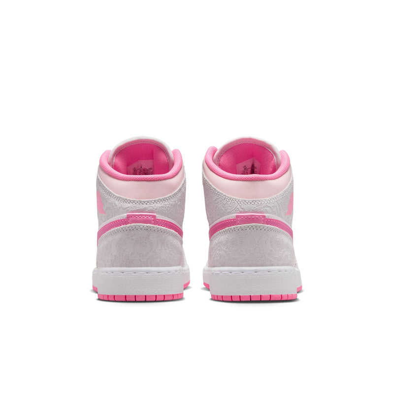 Youth mid-top sneakers in light gray with pink accents; back view with pink lining.