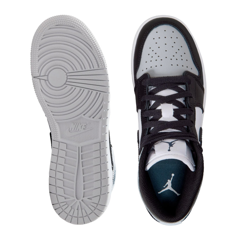 Youth sneaker outsole and side view, white outsole with grip tread, black upper
