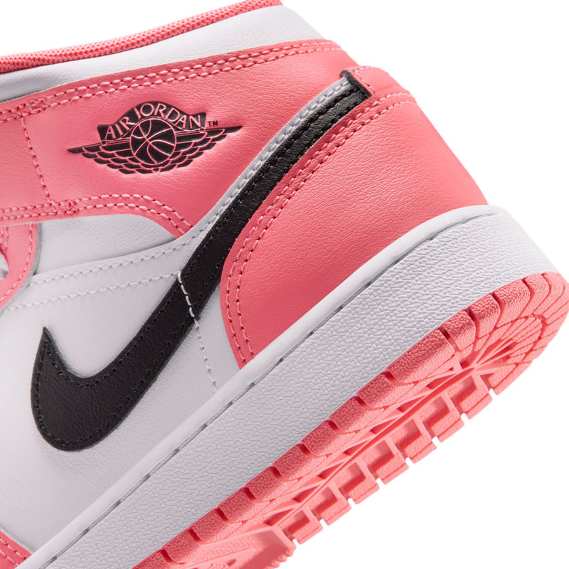 Youth mid-top sneaker heel close-up with AIR JORDAN wing logo and black strap