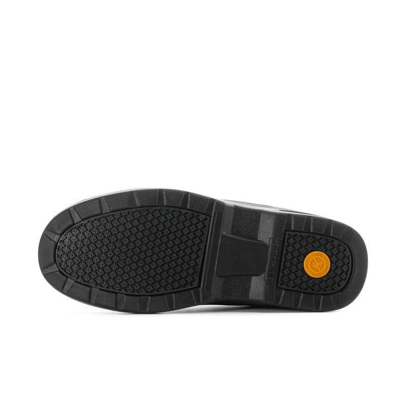 Black rubber outsole of men's slip-on shoes with traction tread and yellow logo