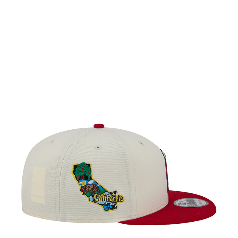 Two-tone baseball cap with white crown, red brim, California state logo patch