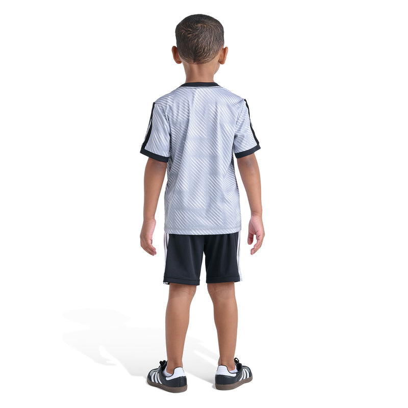 Kids soccer set back view: light blue jersey with black trim and black shorts