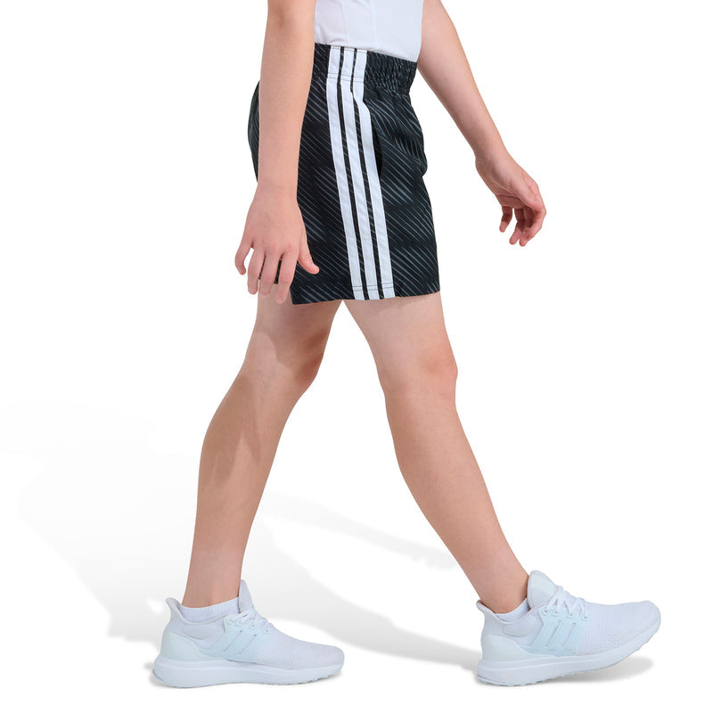 Youth black soccer shorts with white side stripe paneling, adidas logo detail.