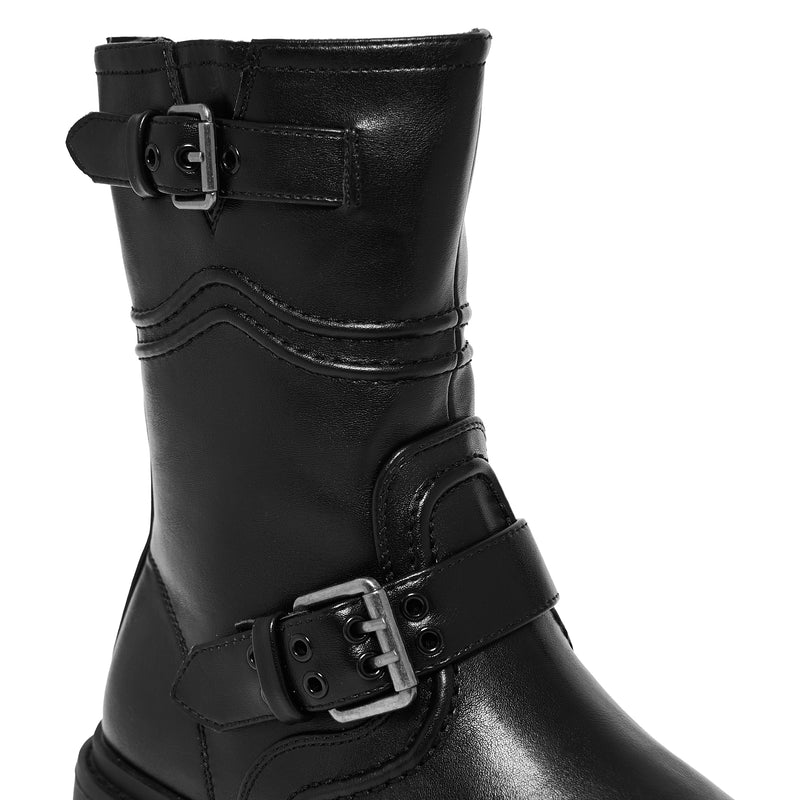 Black leather boot with silver buckles on a white background
