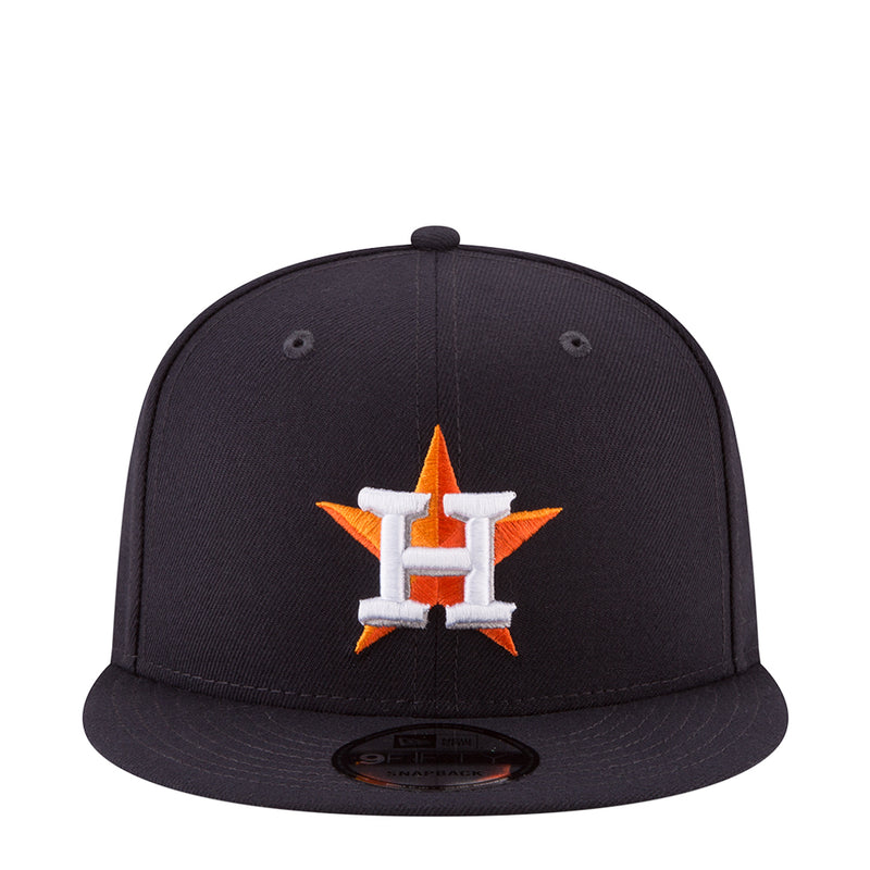 Navy baseball cap with embroidered Astros star logo in orange and white