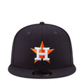 Navy baseball cap with embroidered Astros star logo in orange and white