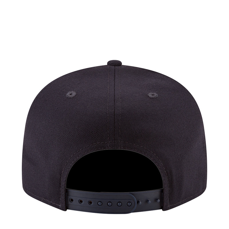 Navy baseball cap with adjustable back strap and ventilation eyelets