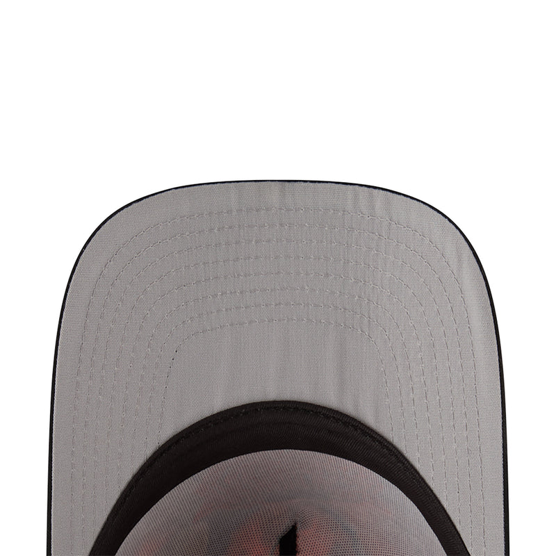 Inside view of baseball cap with light gray headliner and black headband trim