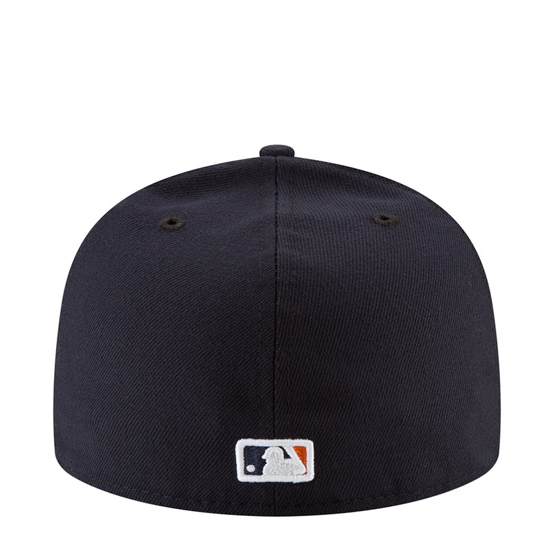 Navy baseball cap with MLB batter logo patch on back