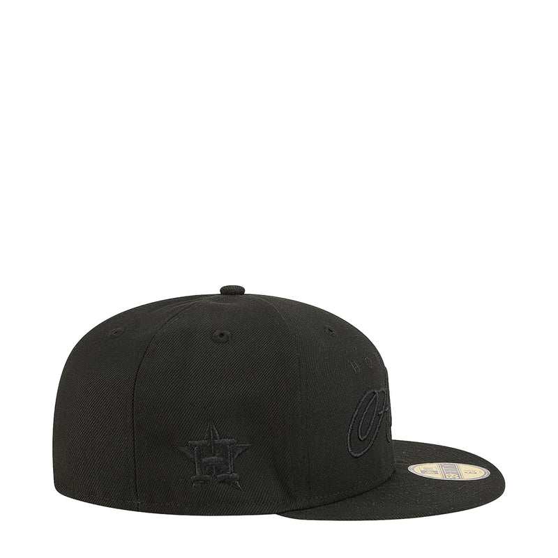 Black baseball cap with small side emblem and flat brim