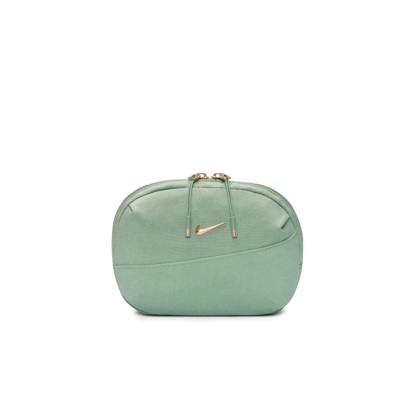 Aura oval crossbody bag in light green, zip top with small gold logo tag