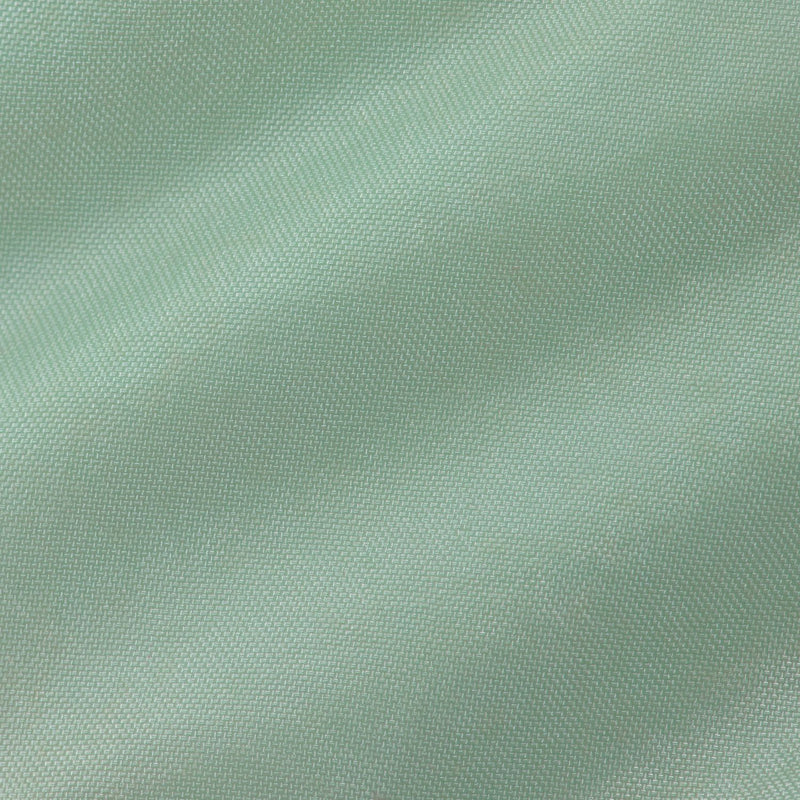 Light green woven crossbody bag fabric texture close-up