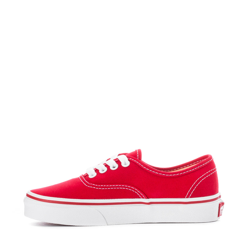 Kids red low-top sneakers with white stitching and white rubber sole